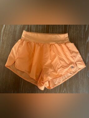 Fabletics Peach-Orange Athletic Shorts